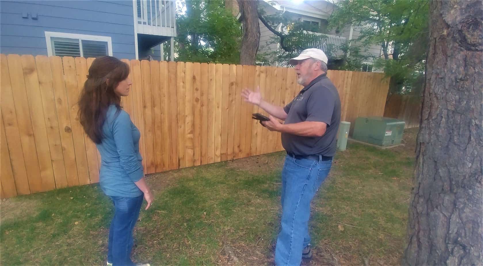 Wildfire Partners Mitigation Specialist speaks with a homeowner participating in the Plains Pilot Project